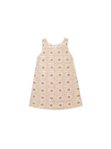 This sleeveless summer essential has an a-line silhouette, scalloped edging, and keyhold button opening on back.  Featuring a floral crochet pattern