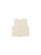 Load image into Gallery viewer, This sleeveless knit vest features buttons down the front and scalloped hem.  Featured in a beige.
