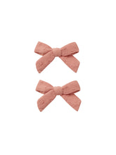 Load image into Gallery viewer, Woven swiss dot cotton bows with clips. Featured in mauve pink.
