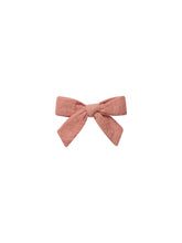 Load image into Gallery viewer, Woven swiss dot cotton bows with clips.  Featured in mauve pink.
