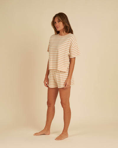 Orange and beige stripe tee and matching shorts made from organic cotton for a comfy fit. 