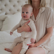 Load image into Gallery viewer, Baby sleepwear in a bamboo fabric and oat gingham print.
