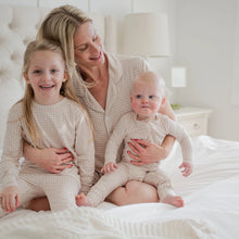 Load image into Gallery viewer, Children sleepwear in a bamboo fabric and oat gingham print.
