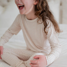 Load image into Gallery viewer, Children sleepwear in a bamboo fabric and oat gingham print. 
