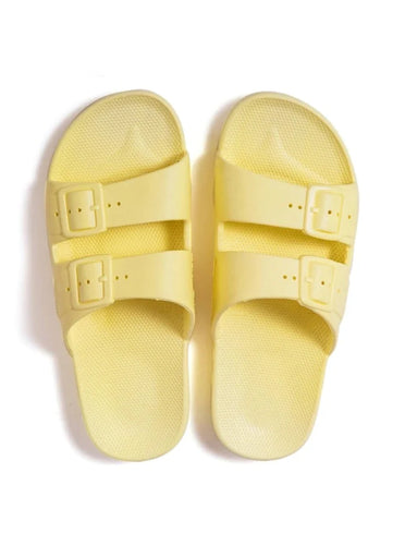 Yellow two strap baby and children sandals with a fixed buckle.