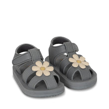 Load image into Gallery viewer, Navy Blue baby strappy sandals featuring a beige flower on the top.
