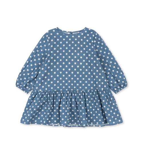 Children's long sleeve blue dress featuring a white polka dot all over print. 