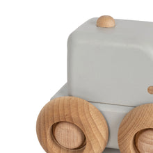 Load image into Gallery viewer, Wooden toy digger featuring a pastel blue and four wheels.
