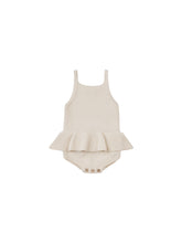 Load image into Gallery viewer, Knit romper with a ruffle waist and tanktop. This romper is featured in a natural colour. 
