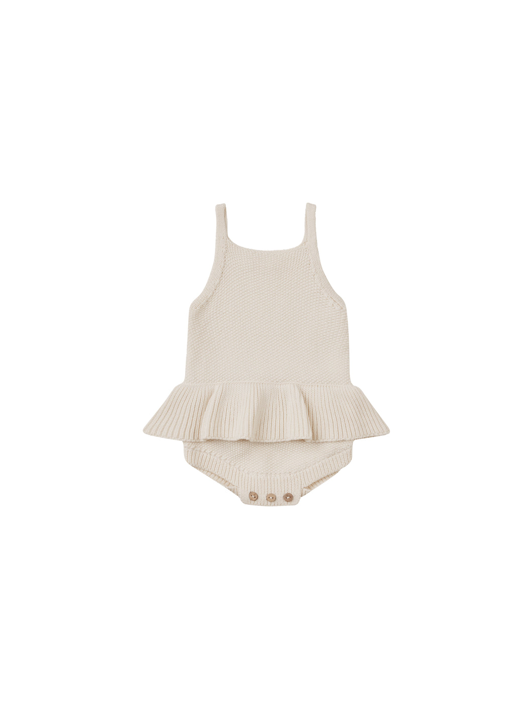 Knit romper with a ruffle waist and tanktop. This romper is featured in a natural colour. 
