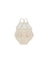Load image into Gallery viewer, Ivory one-piece bathing suit with a ruffle waist and all over sun print.
