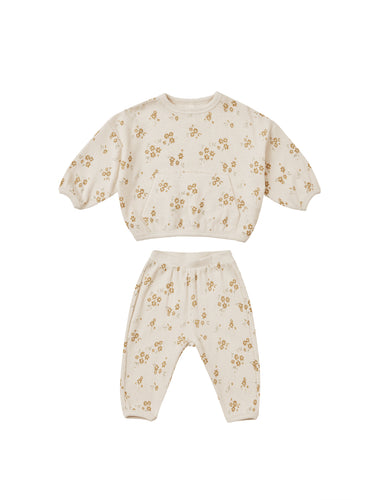 Ivory waffle slouch set with crewneck and matching sweatpants. This set also features a dark yellow floral all over print. 